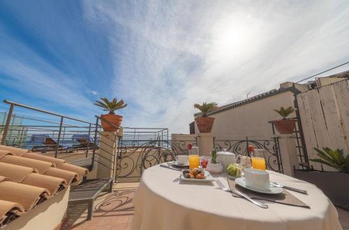 Ein Balkon oder eine Terrasse in der Unterkunft Algilà Ortigia Charme Hotel