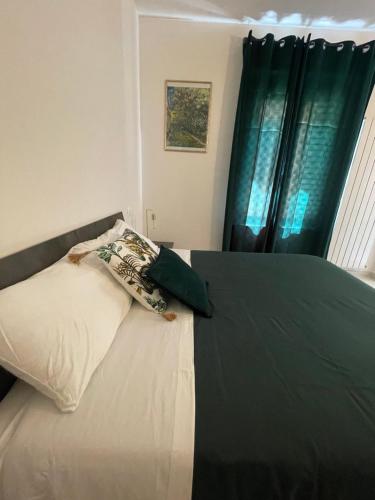 Postel nebo postele na pokoji v ubytování B & B Piazza Angioina