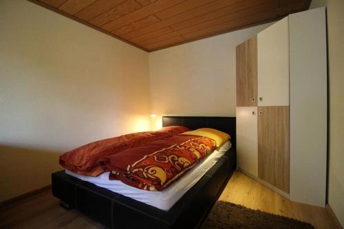 Postel nebo postele na pokoji v ubytování Ferienhaus und Bauwagen Kehl
