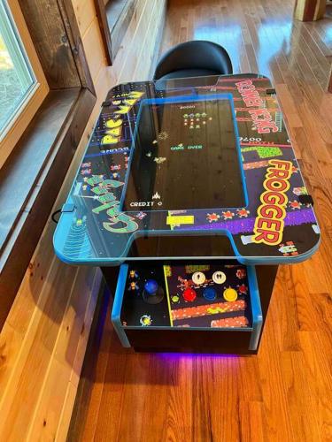 a table with a game on top of it at * * 4 Master Bedrooms, Views, Theater, Arcade, EVC in Gatlinburg