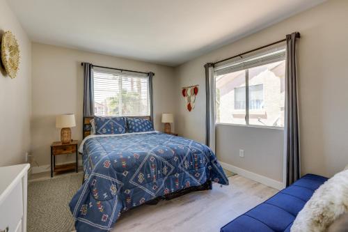 a bedroom with a bed and a large window at Las Vegas Condo with Private Balcony 10 Mi to Strip in Las Vegas
