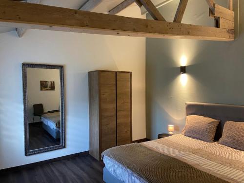 Ένα ή περισσότερα κρεβάτια σε δωμάτιο στο De Heide