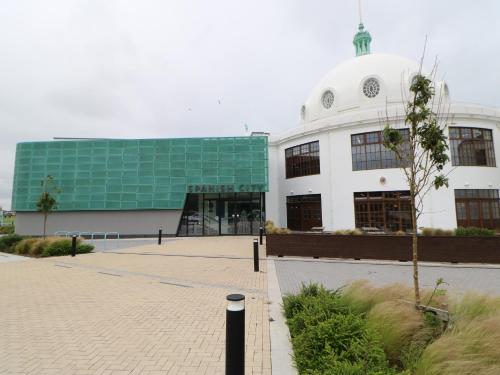 a large building with a green building at 2 Hartburn Road in North Shields