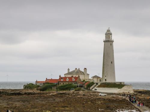 a lighthouse on the shore of a body of water at 2 Hartburn Road in North Shields