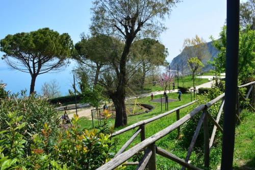 a view of a park with trees and a fence at Belvedere di Ancona in Ancona