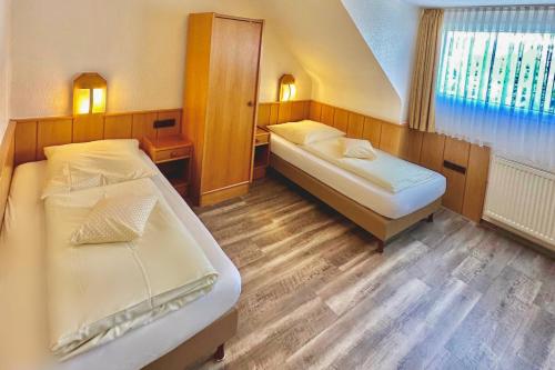 Postel nebo postele na pokoji v ubytování Hotel Imperial