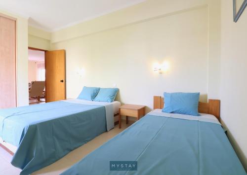 Postel nebo postele na pokoji v ubytování MyStay - Apartamento Alvor