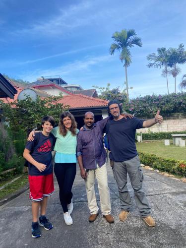 a group of people posing for a picture at Kandy Garden Villa in Kandy