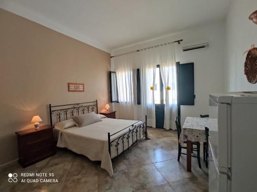 Ένα ή περισσότερα κρεβάτια σε δωμάτιο στο Masseria Don Egidio