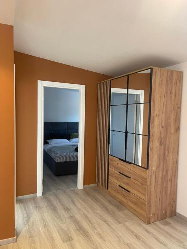 Ένα ή περισσότερα κρεβάτια σε δωμάτιο στο Palmera City apartment