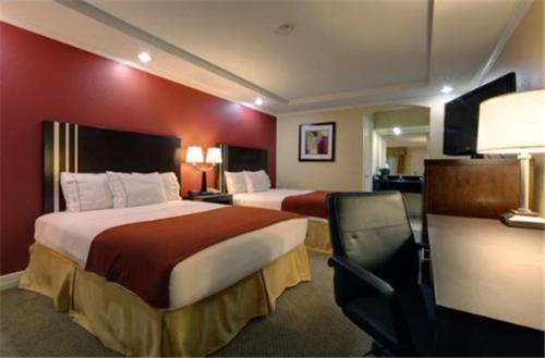 Ένα ή περισσότερα κρεβάτια σε δωμάτιο στο Americas Best Value Inn Angleton