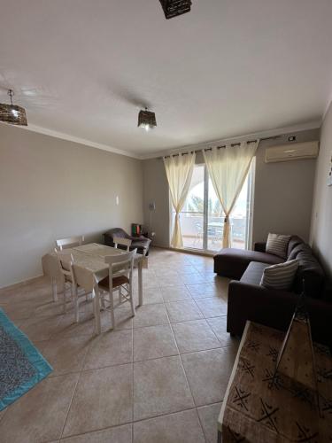 a living room with a couch and a table at sea View Nautilus free wi-fi Sal Rei in Sal Rei