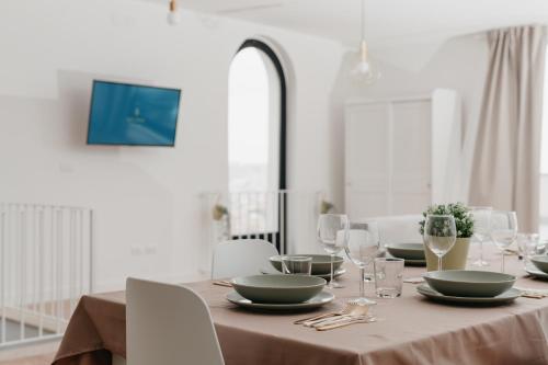 Телевизор и/или развлекательный центр в Vista Napoli Residence by Casa Napoletana