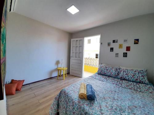 Ένα ή περισσότερα κρεβάτια σε δωμάτιο στο Porto de Galinhas, Maracaipe, piscina, mar a 130m