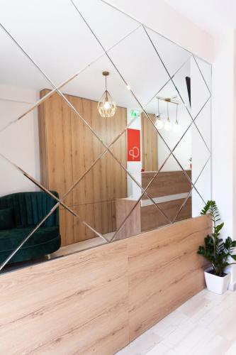 City Plaza Apartments & Rooms