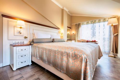 Postel nebo postele na pokoji v ubytování Dalyan Resort & Spa