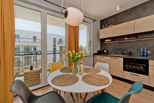 Kuchyň nebo kuchyňský kout v ubytování BlueApart Apartamenty Hotelowe Nexo