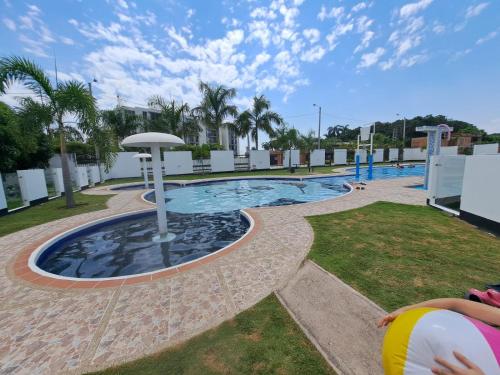 a view of a pool at a resort at Condominio Balcones del country in Flandes