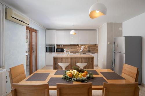 Kuchyň nebo kuchyňský kout v ubytování Holiday Home Franika