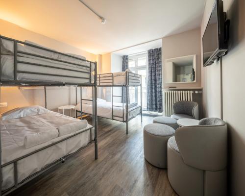 Postel nebo postele na pokoji v ubytování Hotel Bristol