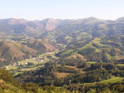 a view of a valley with mountains in the background at CASA RURAL Urruska in Elizondo