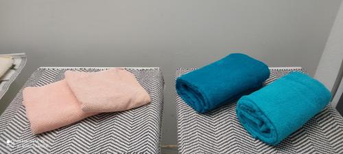 two pillows sitting on top of a bed at Durchreisestop mit Kinder am außergewöhnlichen Spitzboden mit Autobetten und Bad ,Küche im Souterain in Deining