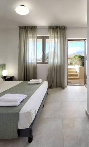 Cama o camas de una habitación en Marilia suite