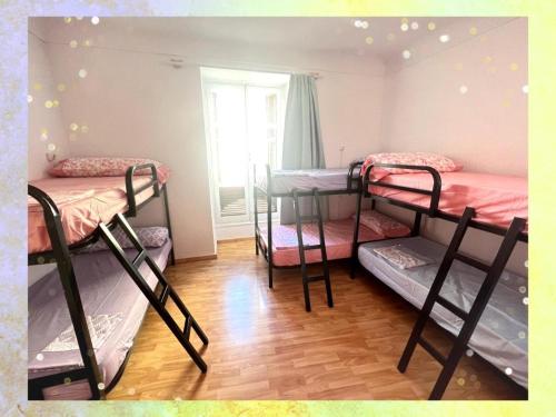 Posteľ alebo postele v izbe v ubytovaní La Merced Centro Rooms
