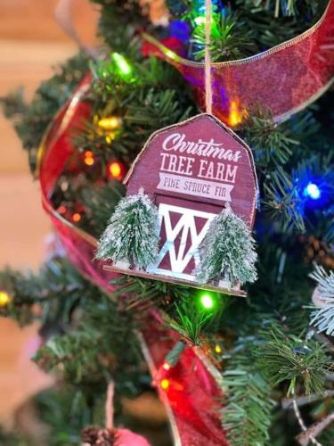 a christmas tree with a christmas ornament on it at * 3 Master BR, Views, Theater, Arcade, Pinball in Gatlinburg