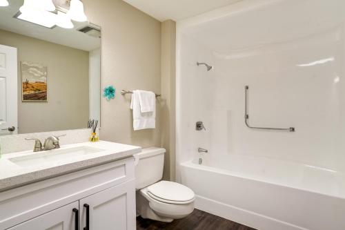 a bathroom with a sink and a toilet and a tub at Sun City West Home in 55 and Community Near Golf in Sun City West