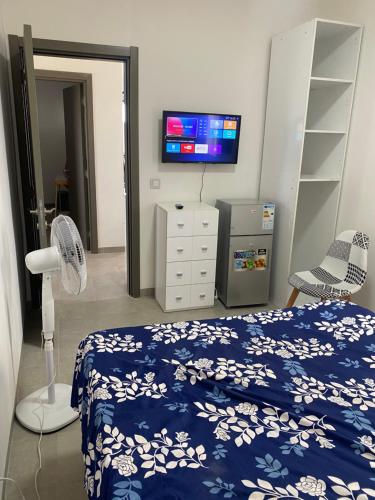 Ένα ή περισσότερα κρεβάτια σε δωμάτιο στο Chambres d'hôtes