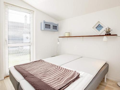 Postel nebo postele na pokoji v ubytování Holiday home Ålbæk XXII