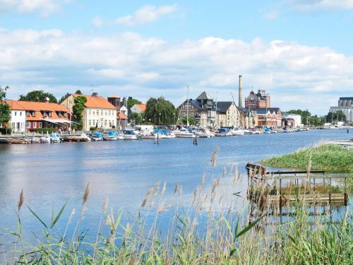 a view of a river with houses and boats at 5 person holiday home in Sibbhult-By Traum in Sibbhult