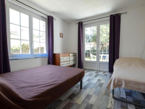 Postel nebo postele na pokoji v ubytování Maison La Palmyre, 4 pièces, 5 personnes - FR-1-705-34