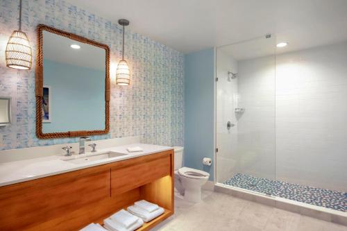 a bathroom with a sink and a toilet and a shower at Margaritaville Vacation Club by Wyndham Nashville in Nashville