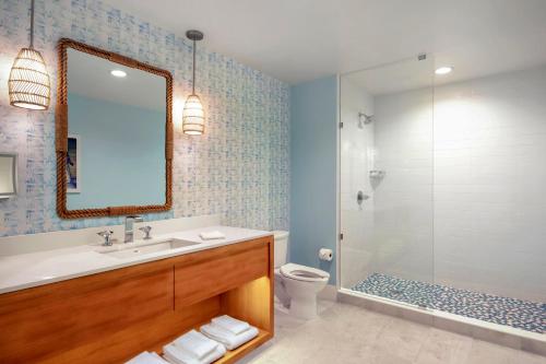 a bathroom with a sink and a toilet and a shower at Margaritaville Vacation Club - Nashville in Nashville