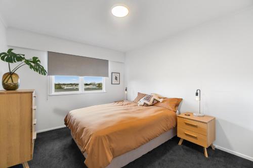 Llit o llits en una habitació de Marama Central - Hamilton Holiday Apartment