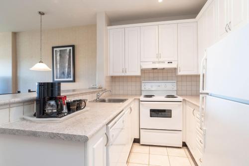 Η κουζίνα ή μικρή κουζίνα στο Sandman Suites Surrey - Guildford