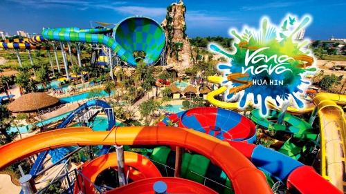 a view of a water park with a roller coaster at Las Tortugas, Cozy condominium on Khao Tao beach, Hua Hin in Khao Tao