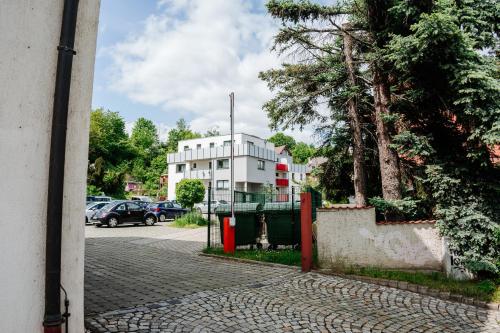a brick street with a building in the background at Design Home Office & Central Hideaway - EAH, ZEISS, SCHOTT in 5 min in Jena
