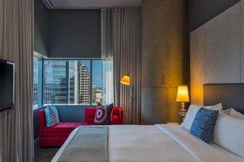 A bed or beds in a room at W Austin