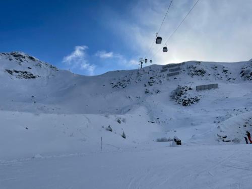 a ski lift over a snow covered mountain at Apartment Sonnenlicht in Schruns-Tschagguns