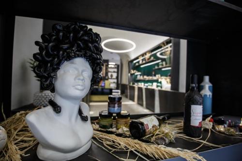 a statue of a woman with black hair on a counter at MAZZINI PALACE in Misterbianco