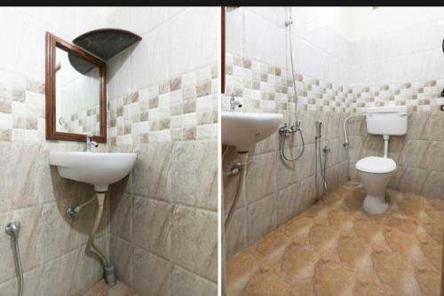 a bathroom with a sink and a toilet and a mirror at Bv Stayz in Chennai