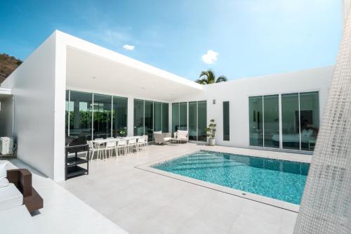 an image of a house with a swimming pool at The Stay Huahin - Luxury Private Pool Villa in Khao Tao