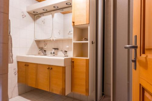 Et badeværelse på Chalet Lienzhubel - GRIWA RENT AG