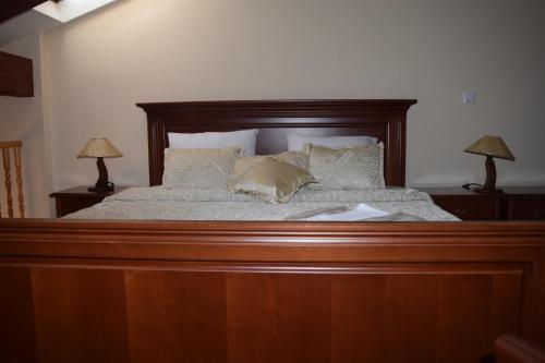 Postel nebo postele na pokoji v ubytování Hotel Tivoli