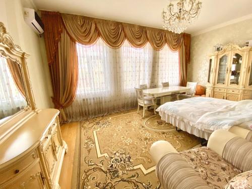 Postel nebo postele na pokoji v ubytování House in Quba