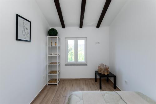 Ένα ή περισσότερα κρεβάτια σε δωμάτιο στο House Villa Vito