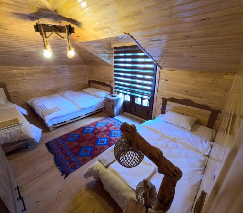 A bed or beds in a room at Selin Yaşam Evi